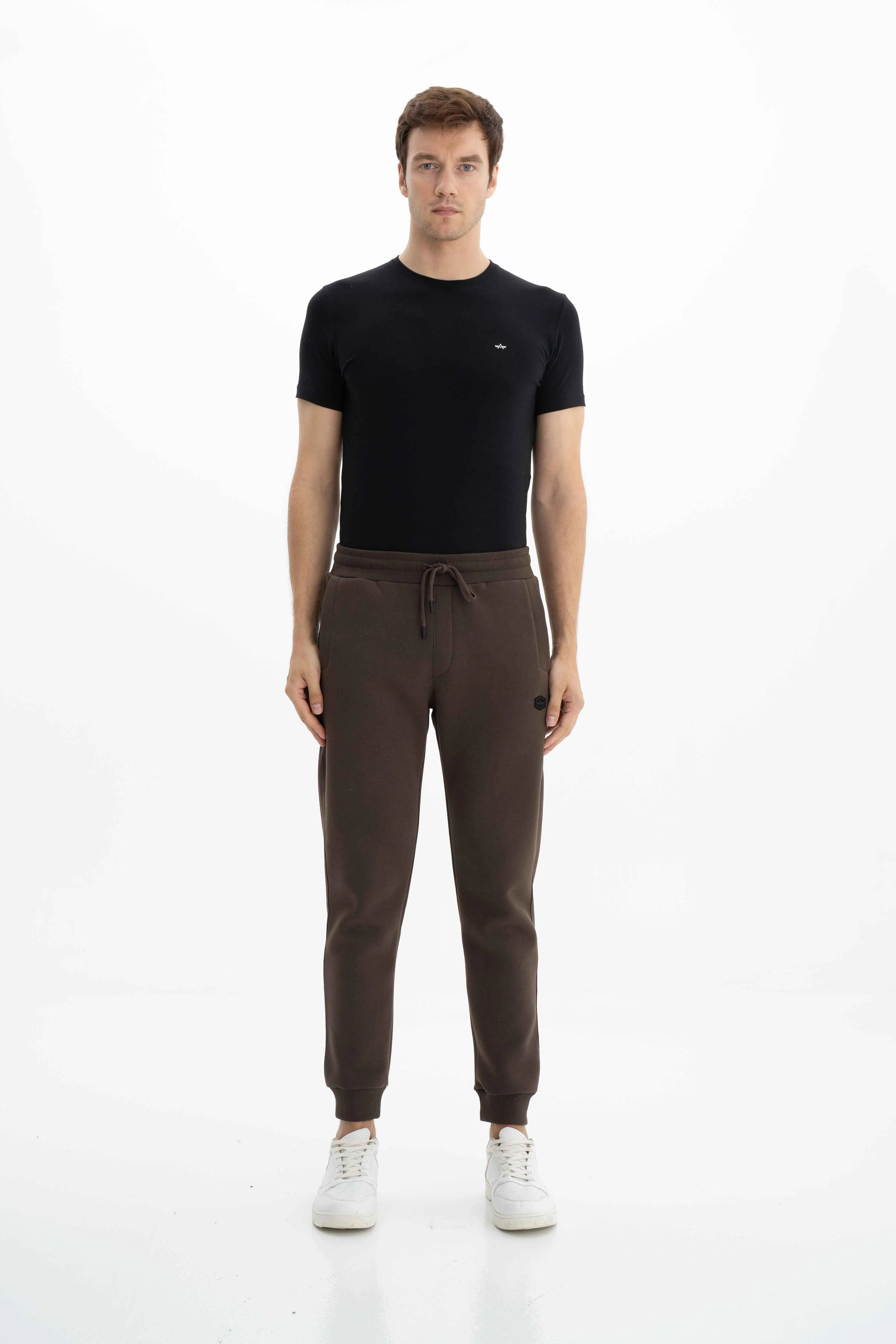 Ar-ma Erkek Eşofman Alti Baskisiz Basic Yandan Fermuarsiz Ve Arkalar Fermuar Cepli Lastikli Dar Paça Örme Kumaş Regular Fit %70 Pamuk %30 Polyester 30/1 Şardonlu Üç İplik K26174680001 - Kahverengi-K1